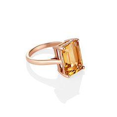 SJCo. Jewellers Manufacturers of fine Jewellery Solid 9ct Rose Gold Citrine Cocktail Ring - RRP $995 9ct Rose Gold. Centre Stone - Citrine, Emerald Cut 14 x 10mm - 9.43ct Ring Shank - A low domed band with upswept shoulders which measures 2.3mm wide and 1.5mm thick. Finger Size - 7.5 US, O UK - Can be made in any size Total weight - 5.9 grams All items are guaranteed to be 100% solid 9ct gold. We are a Sydney based workshop specialising in handmade chains, bangles and rings as well as vintage je Formal Solitaire Citrine Jewelry, Formal Citrine Solitaire Jewelry, Luxury Yellow Gold Octagon Topaz Ring, Timeless Citrine Rings For Formal Occasions, Elegant Octagon Citrine Rings, Luxury Rose Gold Octagon Ring, Rose Gold Luxury Emerald Ring For Formal Occasions, Luxury Rose Gold Emerald Ring For Formal Occasions, Formal Rose Gold Topaz Ring With Prong Setting