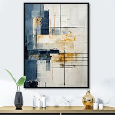 an abstract painting hangs on the wall above a table with candles, vases and a potted plant