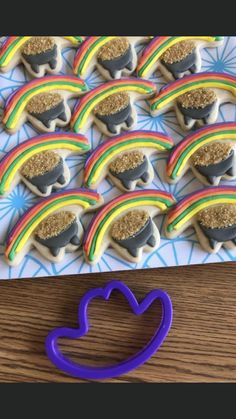 there are many cookies with rainbows on them