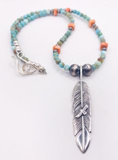 Earthy, boho - Southwestern style hand-strung necklace. This PCJ designed necklace consists of light green faceted round 4mm turquoise beads, 4mm orange spiny oyster square beads and Navajo Pearls (8mm and 4mm) and 2.25" long sterling silver feather pendant with a silver hook & eye clasp. The pendant has a small flying bird design in the middle of the feather. Necklace measures 17" length. Pairs perfectly with the Presidio Earrings!! - Sterling silver - Genuine turquoise and spiny oyster - 1 Adjustable Southwestern Jewelry With Silver Beads, Adjustable Southwestern Silver Turquoise Necklace, Adjustable Southwestern Silver Beaded Jewelry, Bohemian Silver Single Strand Jewelry, Bohemian Single Strand Silver Jewelry, Silver Bohemian Single Strand Jewelry, Bohemian Orange Necklaces With Silver Beads, Artisan Nickel-free Beaded Pendant Necklace, Bohemian Sterling Silver Beaded Dangle Necklaces