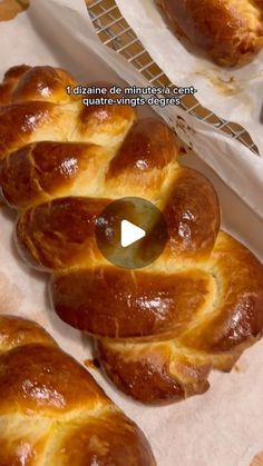 some breads sitting on top of a white tray