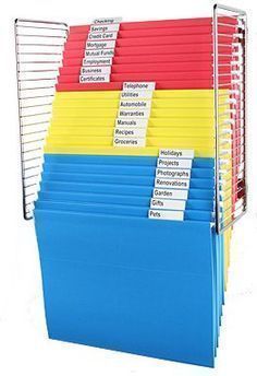 a stack of colored file folders with labels on each side and dividers for each section