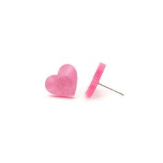 "Add a little love to your everyday wardrobe with these pink pearl heart stud earrings. Made of marbled pink acrylic these earrings are feminine and sweet. These earrings are laser cut from acrylic so they are lightweight and comfortable for your ears. Earrings measure 13mm (about .51\") tall and 14mm wide (about .55\"). Earring posts are nickel and lead free for sensitive ears and come with comfort clutch type backs to keep the earring snug to your ear. ★ ★ ★ Become a VIP and get 20% off your f Hypoallergenic Pink Heart Earrings, Hypoallergenic Heart-shaped Pink Earrings, Pink Hypoallergenic Earrings For Valentine's Day, Trendy Pink Heart Earrings For Gift, Trendy Pink Heart Earrings As Gift, Pink Heart Earrings For Everyday, Pink Heart-shaped Everyday Earrings, Pink Pearl Earrings, Pearl Heart