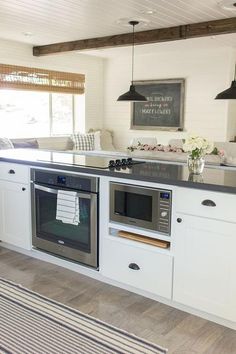 the kitchen is clean and ready to be used as an appliance for cooking