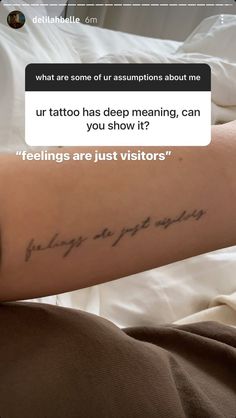 a person with a tattoo on their arm that says feelings are just visitor's