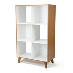 a white and wood bookcase with four shelves on one side, the other half open