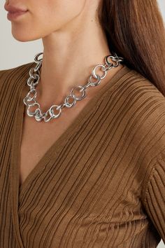 LIÉ STUDIO's Amalie and Cecilie Moosgaard are uniform dressers who like to keep things simple - a philosophy mirrored in their jewelry. This 'Laura' necklace is crafted from silver-plated brass and strung with multiple links in varying shapes. Style yours with a simple crew-neck tee or sweater. Timeless Silver Jewelry For Workwear, Timeless Silver Jewelry For Work, Elegant Metal Jewelry For Work, Elegant Silver Jewelry For Workwear, Elegant Silver Jewelry For Work, Modern Jewelry With Polished Finish For Workwear, Elegant Silver Jewelry For Office, Modern Metal Jewelry For Work, Cecilie Moosgaard