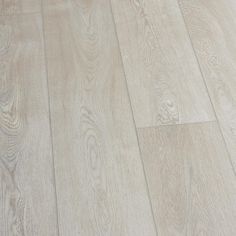 an image of white wood flooring that looks like it has been cleaned and polished