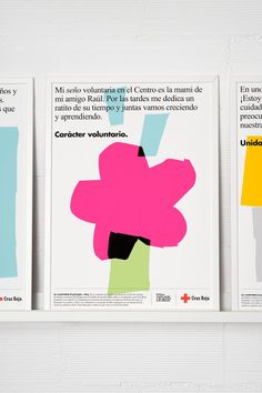 three posters are hanging on the wall with different colors and shapes in spanish, english and french