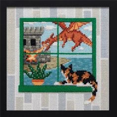 a cross stitch picture with a cat and dog looking out the window at an animal