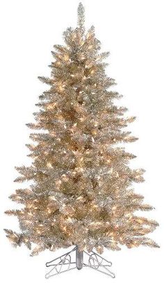 a white christmas tree with lights and snow on the top, in front of a white background