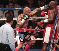 two men in the ring during a boxing match