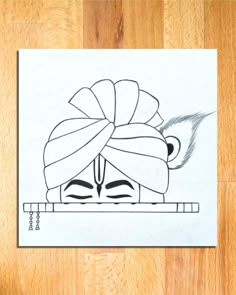 a drawing of a woman's head with a turban on her head