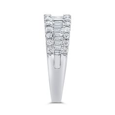 This is a magnificent diamond baguette ring stamped in 14K White Gold. Featuring 30 round brilliant diamonds and 21 baguette shape diamonds (G-H Color, SI Clarity) that weigh a total of 1.27 carats. This is part of Amy's Diamond Baguette Collection. Details: ►Metal: White Gold ►Gold Purity: 14K ►Diamond Shape: Round and Baguette ►Baguette Diamond Weight: 0.64 carat ►Round Diamond Weight: 0.63 carat ►Diamond Clarity & Grade: G-H Color & SI1 Clarity ►Total Item Weight: 5.32 grams ►Style # Diamond Baguette Ring, Morganite Pendant, 14k White Gold Diamond Ring, Diamond Gold Ring, Diamond Baguette, Baguette Diamond Rings, Morganite Diamond, Baguette Ring, Rose Gold Pendant