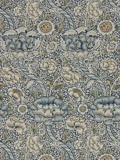 an intricately designed wallpaper with blue and white flowers on it's sides