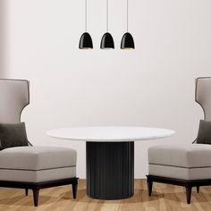 two chairs and a table in a room with white walls, wood floors and wooden flooring