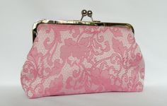 NOTE: ALL OF MY BAGS ARE HANDMADE TO CUSTOMERS INDIVIDUAL ORDERS!! Amazingly beautiful pink floral design clutch purse, made out of a lovely brocade fabric. Fully lined with Silver satin fabric for a nice contrast. Reinforced with heavy weight interlining and interfacing so it maintains its shape. All stress points have been double stitched to maintain structure. CHAIN HANDLE INCLUDED. The size is perfect to carry your essentials for a day or night out, i.e mobile phones, keys, make-up, credit c Bridal Bags, Pink Clutch Bag, Wedding Clutch Purse, Clutch Pink, Silk Clutch, Bridesmaid Clutches, Clutch Bag Wedding, Bridal Purse, Wedding Bags