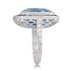 This impressive ring features a 16.35 carat emerald cut aquamarine surrounded by a halo of diamonds. Stunning openwork filigree adorns the under gallery, with accenting diamonds on either shoulder. ✦ DIAMOND SPECIFICATIONS: Diamond Cut: Emerald Cut Diamond Weight 16.35 Carats ✦ ENGAGEMENT RING SPECIFICATIONS: Ring Material: Platinum Stones: Aquamarine, Diamond, Sapphire ✦ WHAT COMES IN YOUR SHIPMENT: - Your Engagement Ring - Quality Ring Box - Jewelry Cleaner - UGL Certificate ✦ WHY SHOP WITH US Gia Certified Octagon Sapphire Luxury Ring, Gia Certified Octagon Sapphire Ring, Luxury Style, Luxury Gia Certified Octagon Sapphire Ring, Luxury Emerald Cut Gemstone Halo Ring, Luxury Octagon Sapphire Ring With Center Stone, Formal Gia Certified Emerald Cut Sapphire Ring, Gia Certified Emerald Cut Sapphire Ring For Formal Occasions, Emerald Cut Gia Certified Sapphire Ring For Formal Occasions, Luxury Sapphire Baguette Cut Ring With Halo Setting