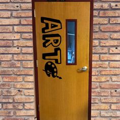 a wooden door with the word art on it