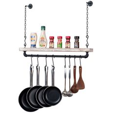 a rack with pots and pans hanging from it's sides, holding cooking utensils