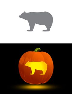 an orange pumpkin with a bear cut out of it