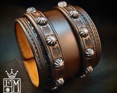 Leather Wrist Cuff Saddle brown Traditional American Cowboy ROCKSTAR Bracelet made for YOU in USA by Freddie Matara Vintage Leather Bracelets With Rivets, Vintage Leather Concho Bracelets, Western Brown Leather Bracelet With Concho, Brown Western Leather Bracelet With Concho, Western Brown Leather Concho Bracelet, Brown Engraved Leather Bracelet, Engraved Brown Leather Bracelet, Western Leather Concho Cuff Bracelet, Brown Leather Engraved Cuff Bracelet