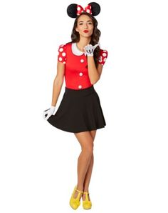 a woman dressed in minnie mouse costume