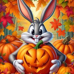 a rabbit holding a jack o lantern in front of pumpkins and leaves with autumn foliage behind it