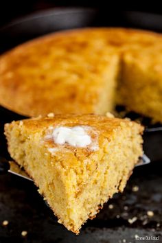 a piece of cornbread cake with icing on it