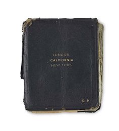 an old black book with the words london california on it