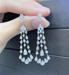 LAST CALL, LAST CHANCE LIQUIDATION SALE The Following Item we are offering is a Rare Important Radiant 18KT Gold Large Rare Fancy Gorgeous Diamond Chandelier Dangle Earrings. Earrings are comprised of Gorgeous Beautiful Glittering Dangling Diamonds T.C.W. approx 5CTS These Gorgeous Earrings are a Rare Sample Pair With Tags from a Private Manufacturer that sold to Important 5 Star Hotel and Fine Jewelry Stores. Original Retail Price: $19,849.00!! We are in the Process of Liquidation and selling a Rare Diamond, Diamond Chandelier, 5 Star Hotel, Liquidation Sale, Earring Box, Fancy Diamonds, Star Hotel, Etsy Earrings Dangle, Gorgeous Jewelry