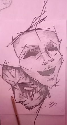 a drawing of a woman's face is shown on a piece of pink paper