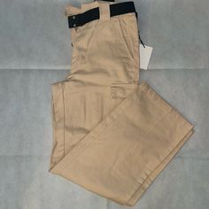 Tna Cargo Flax Beige Cargo Pants Size Small Nwt. With Black Adjustable Belt And Wide Legs. Lay Flat Measurements Waist 14 1/2, Rise 11 1/2, Leg Width 10, Inseam 30, And Out Seam 40 3/4 Inches. Mid-rise Beige Pants With Belt Loops, Beige Mid-rise Pants With Belt Loops, Beige Cargo Pants, Beige Cargo, Wide Legs, Adjustable Belt, Cargo Pants, Lay Flat, Pant Jumpsuit