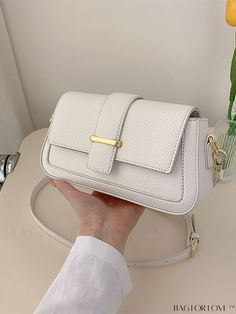 BagForLove - Compact White Flap Saddle Bag for a Sleek and Minimalistic Look Product Description Color White Magnetic No Type Square Bag Bag Size Small Strap Type Adjustable Pattern Type Plain Closure Type Flap Features Waterproof Style Fashionable Composition 100% Polyurethane Material PU Leather Size Chart INCH CM Strap Length Bag Length Bag Width Bag Height 47.2 inch 9.4 inch 2.4 inch 5.1 inch Strap Length Bag Length Bag Width Bag Height 120 cm 24 cm 6 cm 13 cm Details Pictures Similar Products h2 { text-align: center; } /* æ¢è¡ */ li{ white-space: normal; word-break: break-all; word-wrap: break-word; } .red-box { width: 100%; display: flex; flex-direction: row; flex-wrap: wrap; justify-content: center; } .red-box > div { width: 190px; height: 250px; margin: 10px; } .red-box > div > a Word Wrap, Saddle Bag, Bag Bag, Square Bag, Saddle Bags, Saddle, Minimalist Design, Pu Leather, 4 Inch