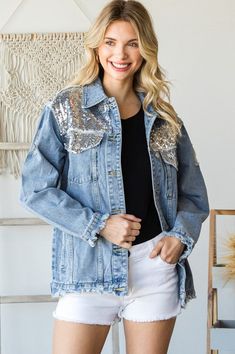 Button Up Long Sleeve Denim Jacket with sequin detail on shoulders and down back Model is 5'7" and wearing a size Small. Spring Denim Jacket With Sequins Long Sleeve, Spring Denim Jacket With Sequins And Long Sleeves, Spring Sequined Long Sleeve Denim Jacket, Trendy Spring Outerwear With Contrast Sequin, Trendy Long Sleeve Denim Jacket With Sequins, Trendy Long-sleeve Denim Jacket With Sequins, Spring Party Denim Jacket, Long Sleeve Denim Jacket For Party, Casual Long Sleeve Denim Jacket With Sequins