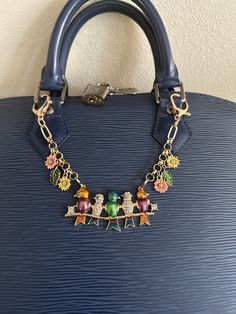 Made with one piece enameled birds on a high quality gold chain. Accented with enameled leaves and flowers. Fun  and colorful charm Multicolor Bird Design Jewelry, Charm Chain, Purse Charms, Gold Chain, Gold Chains, Charms, Birds, Purse, Valentines