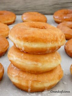 glazed donuts stacked on top of each other