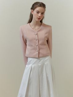 This piece of clothing is a textured jacket featuring a notched lapel and a three-button closure. This piece of clothing is a textured jacket featuring a notched lapel and a three-button closure. It is tailored with a structured fit and includes two patch pockets on the front. The sleeves are full-length, and the overall design exudes a formal yet contemporary aesthetic.- The jacket presents a sophisticated appearance with its notched lapels and button details.- Patch pockets add both function and a casual touch to the otherwise formal item.- Its textured fabric contributes to a rich, tactile experience and visual depth. Classic Single Breasted V-neck Outerwear, Tailored Single Breasted V-neck Outerwear, Tailored Single-breasted V-neck Outerwear, Tailored V-neck Blazer With Buttons, Tailored V-neck Blazer, Tailored V-neck Outerwear With Buttons, Semi-formal Spring Tweed Jacket With Pockets, Business V-neck Single Button Outerwear, Spring Semi-formal Tweed Jacket With Pockets