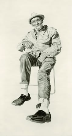 an old man sitting in a chair with his legs crossed