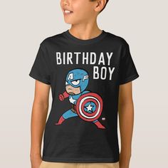 a young boy wearing a captain america birthday t - shirt with the words happy birthday boy on it