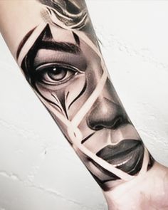 a man's arm with an artistic tattoo design on it, depicting the face of a woman