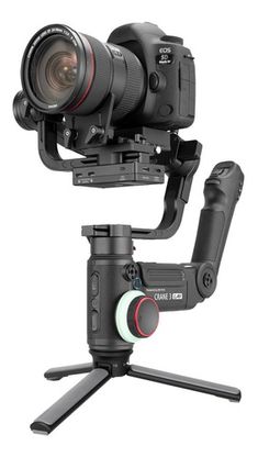 a camera attached to a tripod on a white background with the caption device below it