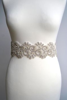 "Wedding Belt, Bridal Belt, Bridesmaid Belt, Bridesmaid Belt, Crystal Rhinestone Pearls Ready to ship Sisi pearls is unique luzury bridal belt with large rhinestone crystal pearls applique. Fully encrusted with silver large crystals and pearls attached to double side satin ribbon. It will look great with any color dress, being either white, diamond, ivory, or antique. Looks great in the front , or on the side ! Made of : - lovely stunning design applique decorated with crystal, rhinestones pearl White Rhinestone Sashes For Bridesmaids, White Bridesmaid Sashes With Rhinestones, White Bridesmaid Sash With Rhinestones, Wedding Bridal Belt Beaded With Pearls, Wedding Bridal Belt With Beaded Pearls, Wedding Pearl Beaded Bridal Belt, Fitted Beaded Bridal Belt For Wedding, White Pearl Embellished Sashes For Wedding, Embellished White Bridal Belt For Bridesmaid