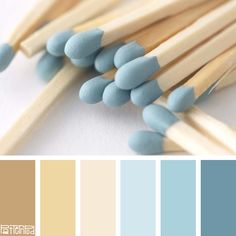 blue and beige color palette with matchesticks