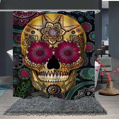 a decorative shower curtain with a colorful skull and flowers on the front, in a living room