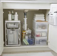 an organized bathroom under the sink