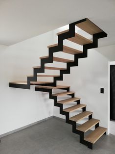 a staircase made out of wood and metal