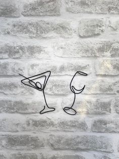 "Handmade wire set of wine and martini glasses. Perfect addition to any bar or kitchen! Approx dimensions: Small martini glass 16x10cm / 6x4\" Small wine glass 14.5x5cm / 6x2\" XL maritini glass / 11x7.5\" XL wine glass / 10x3\" Each item is hand made by me and may be slightly different to the picture, which makes it completely unique and special. For any special requirements, please DM me." Small Martini Glass Tattoo, Martini Glass Tattoo, Martini Tattoo, Drink Tattoo, Wine Glass Tattoo, Desert Tattoo, Wine Tattoo, Wire Decor, Glass Tattoo