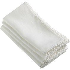 four white napkins stacked on top of each other in front of a white background