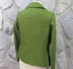 "This is a vintage suit jacket, custom tailored by Stephen Lo from the Hilton Hotel Arcade in Hong Kong. Green wool with fabric covered buttons. Excellent condition. Beautifully made. Measures about a 36\" bust. Length is about 20\" from top of shoulder to bottom edge." Fitted Tweed Office Jacket, Fitted Tweed Jacket For Office, Fitted Green Blazer With Buttons, Green Fitted Blazer With Buttons, Fitted Green Tweed Jacket With Button Closure, Vintage Tailored Green Blazer, Vintage Fitted Tweed Jacket For Office, Fitted Retro Tweed Jacket With Buttons, Vintage Fitted Blazer With Buttons